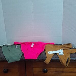4 URBAN OUTFITTERS  THONGS...NWT.  Size L